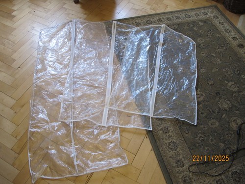 Three garment covers 1 x - -,